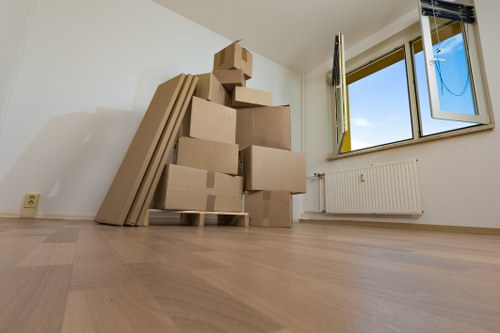 Packed household boxes ready for a home move in Leaves Green