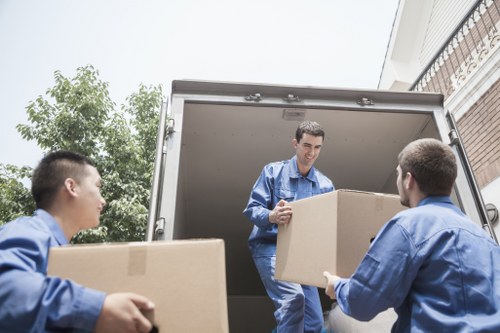 Packed moving boxes and protective wrapping for a home removal