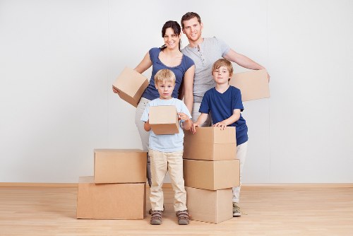 Packed moving boxes prepared for relocation in Leaves Green