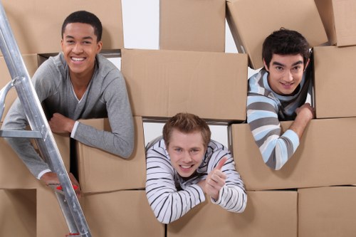 Trained moving staff carrying furniture with care in Leavesgreen