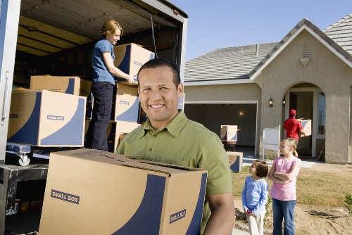 Local movers handling furniture and packing for a residential relocation in Leaves Green