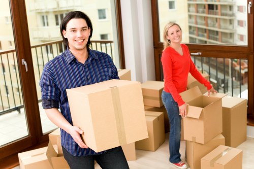 Packed boxes and household items ready for a local van move